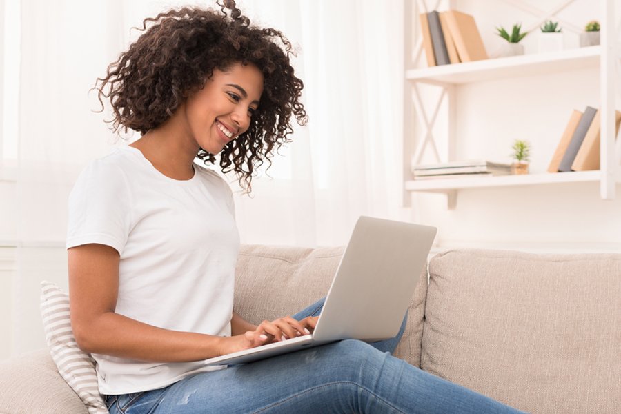 Woman with Laptop - Improve Your Health | Patient Resources Page | DOHC